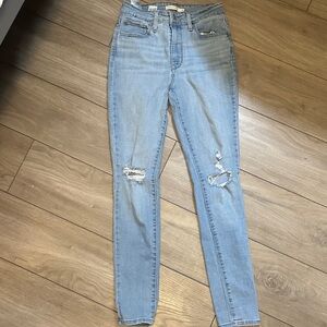 Levi's High Rise Light Blue Distressed Jeans